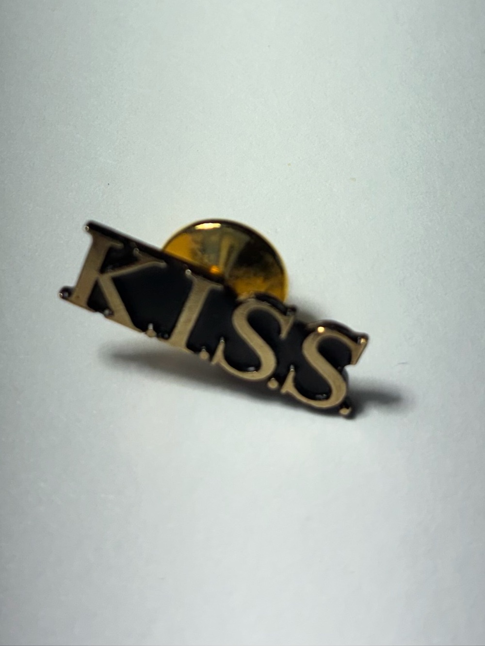 Kiss Gold and Black Logo Pin